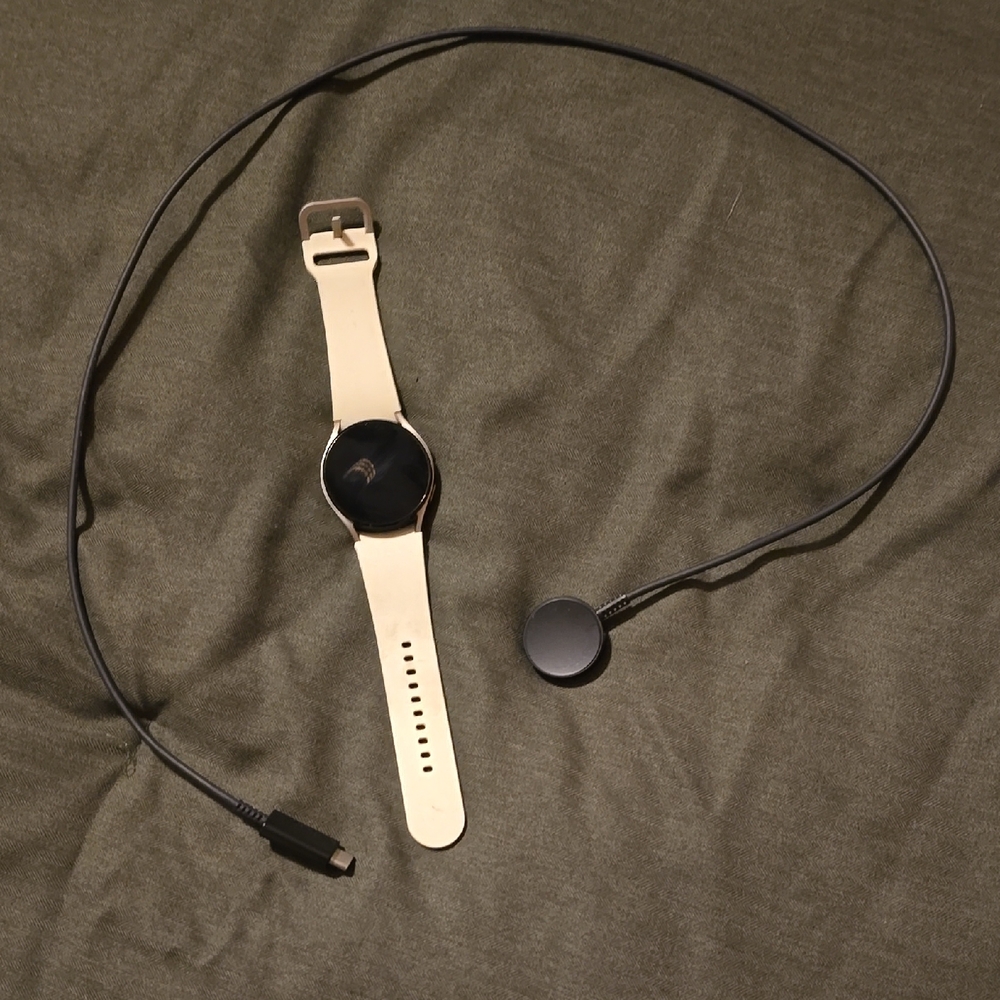 Samsung Smartwatch with Beige Band and Black Face